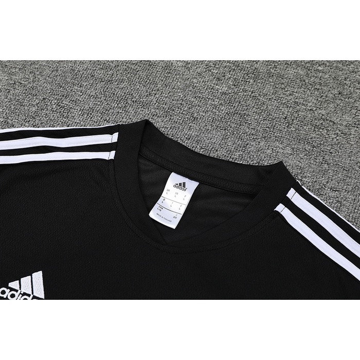 Chandal del Real Madrid Manga Corta 22-23 Negro y Purpura - Pantalon Corto